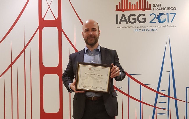 Seamus Small, CEO of Kinesis Health Technology, with his company’s IAGG award.