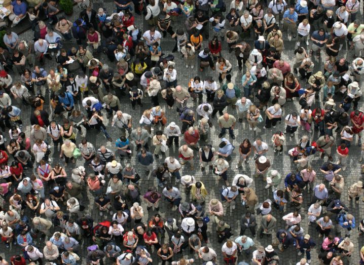 Crowd image by Olga Kolos via Shutterstock