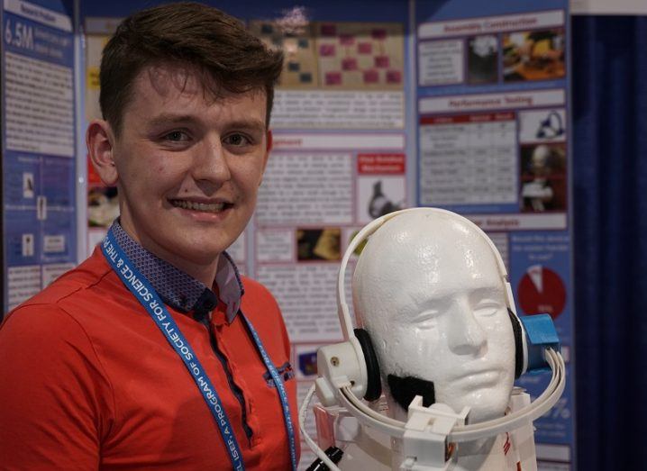 Aaron Hannon with his device at ISEF 2018