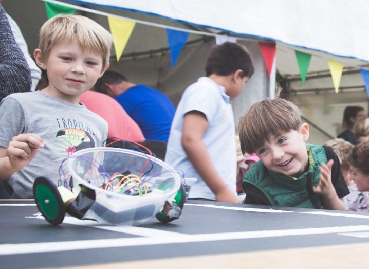 Children playing with robot at Dublin Maker