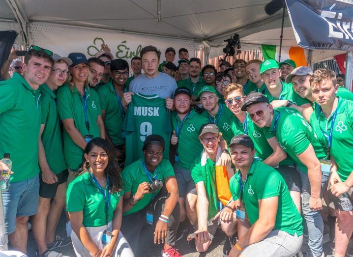 Team Éirloop posing with Elon Musk