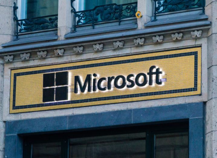 Microsoft shopfront in Berlin. Microsoft logo created with black and gold mosaic tiles.