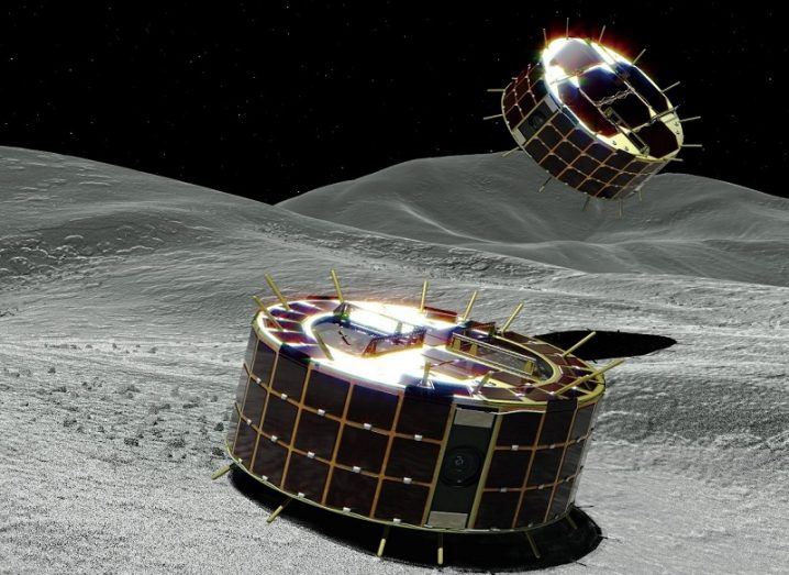 Illustration of the Japanese space agency rovers landing on the surface of the asteroid, Ryugu.