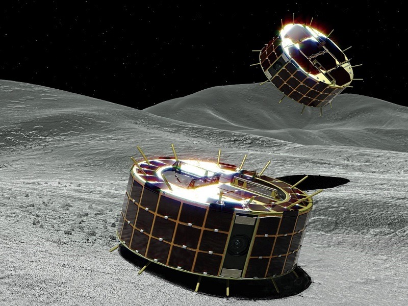 Photos Reveal Stunning Moment Japan Lands Rovers On Asteroid