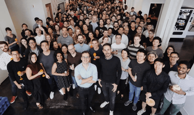 Instagram founders Mike Krieger and Kevin Systrom in front of their team. 