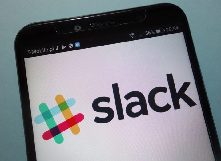 Slack logo, a colourful hash sign on a mobile phone.