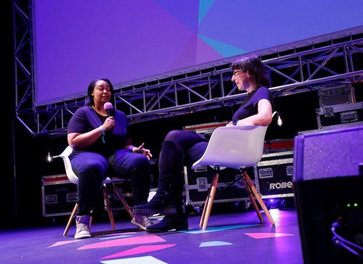 Arlan Hamilton and Ann O'Dea sitting and chatting on stage at Inspirefest 2018.