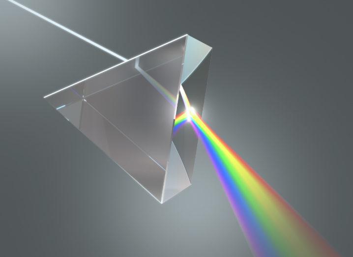 Crystal prism disperses white light into many colours.