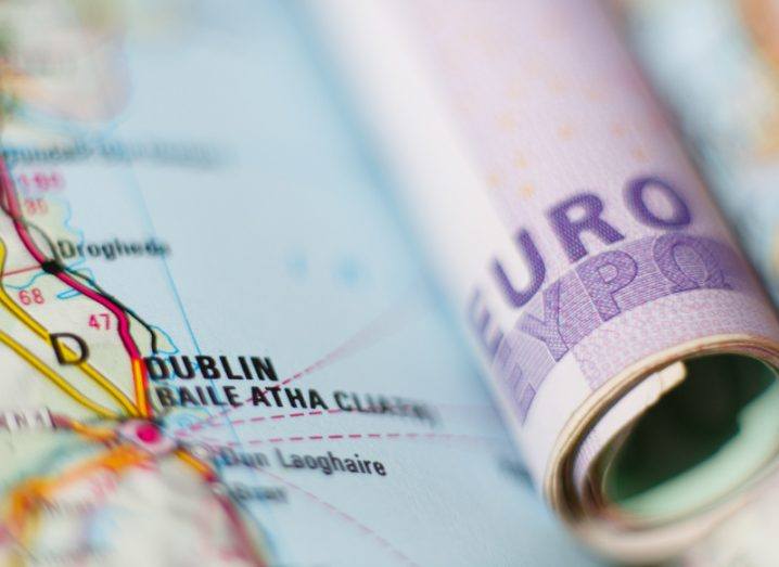 Euro banknotes on a geographical map of Dublin.