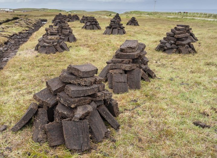 Turf piles beside an Irish bog.