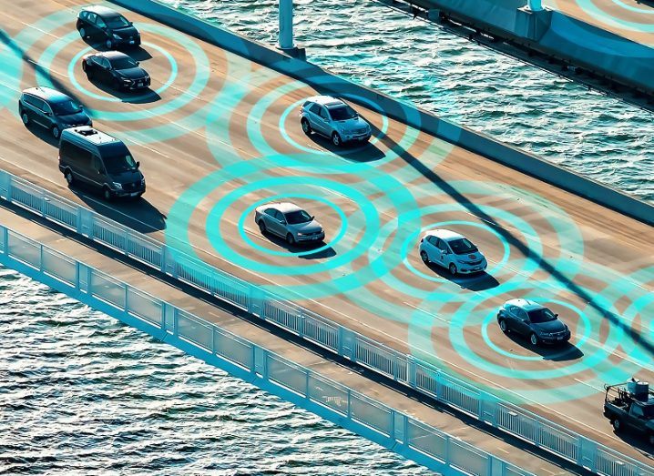 Concept shot of autonomous cars on a bridge communicating with one another.