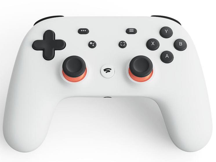 A white console controller with the traditional configuration of buttons. On the left side, there are black buttons for direction and on the right side there are 'X, Y, A and B' buttons. There are two analogues in the centre of the controller and a number of buttons that have yet to have a use identified for them yet.