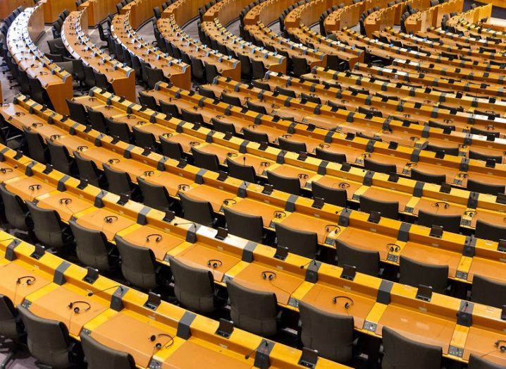 Top-down view of empty seats at the European Parliament.
