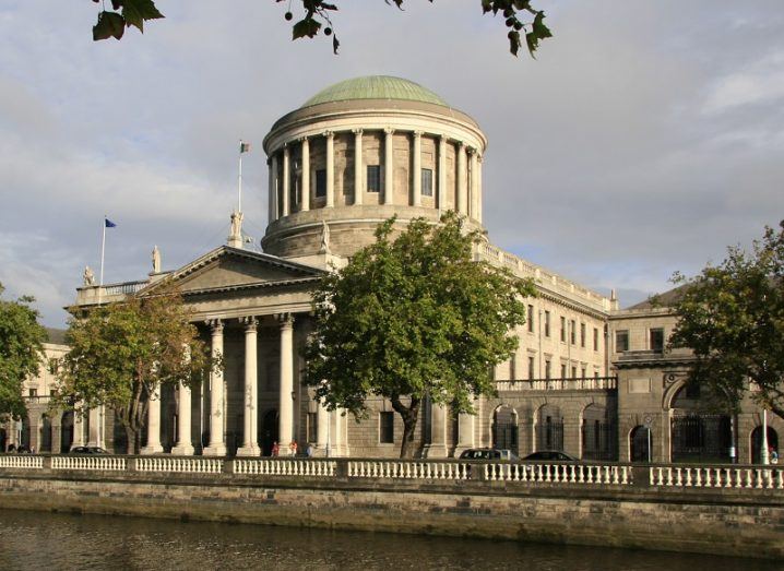 The Four Courts in Dublin against a grey sky.