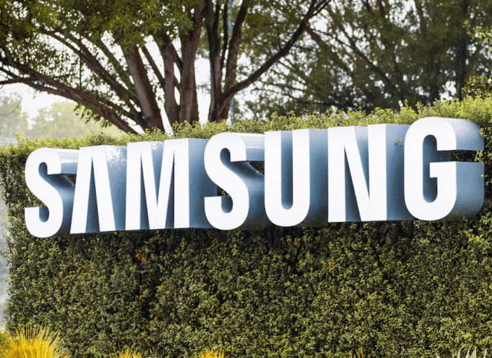 The Samsung logo on the front of a hedge.