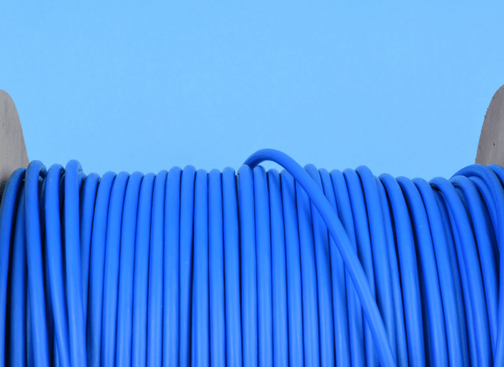 A spool of blue network cable.