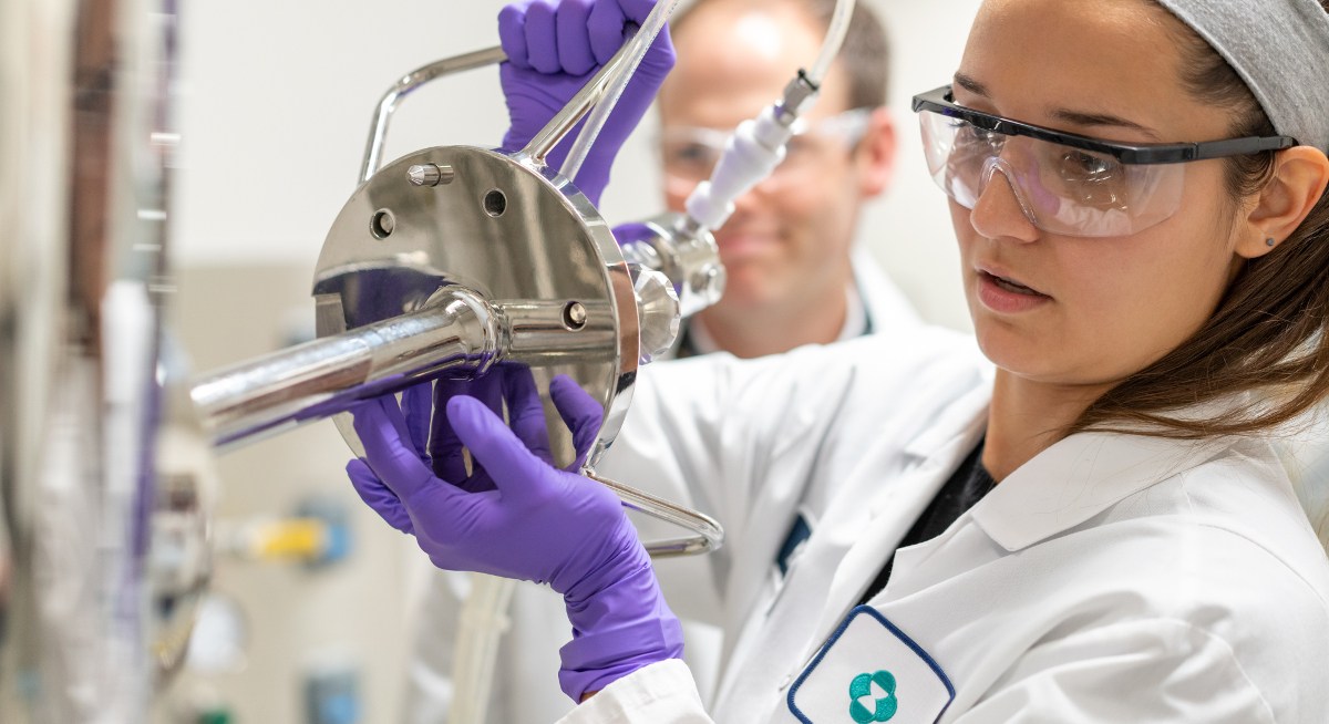 MSD employees working with equipment in a lab.