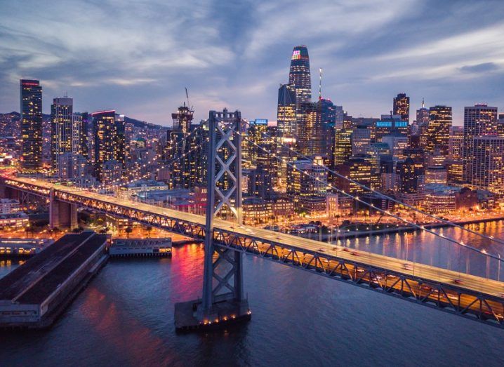 Aerial view of San Francisco at the Bay Bridge at night.
