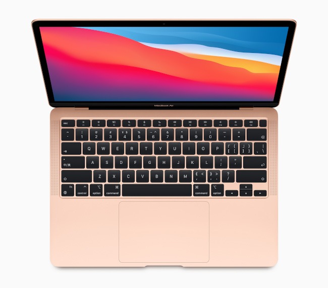 A rose-coloured MacBook Air opened to display the full keyboard.