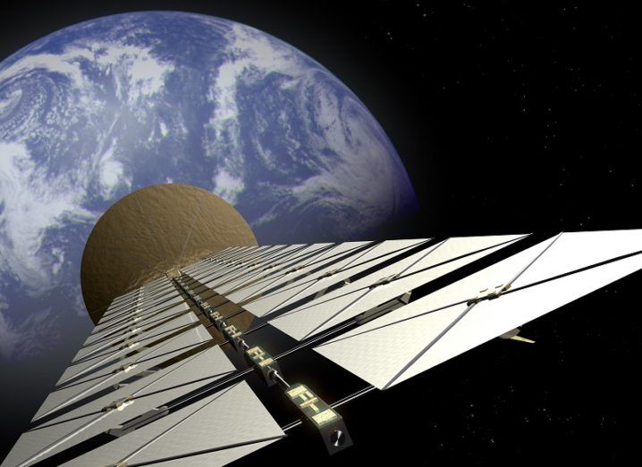 Artist's impression of a solar space station satellite above Earth.