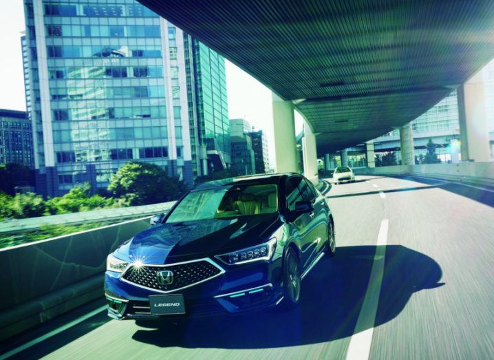 Photo of the Honda self-driving car on a highway in Japan.