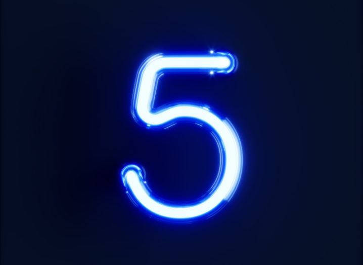 Illustration of the number five in blue with a black background.