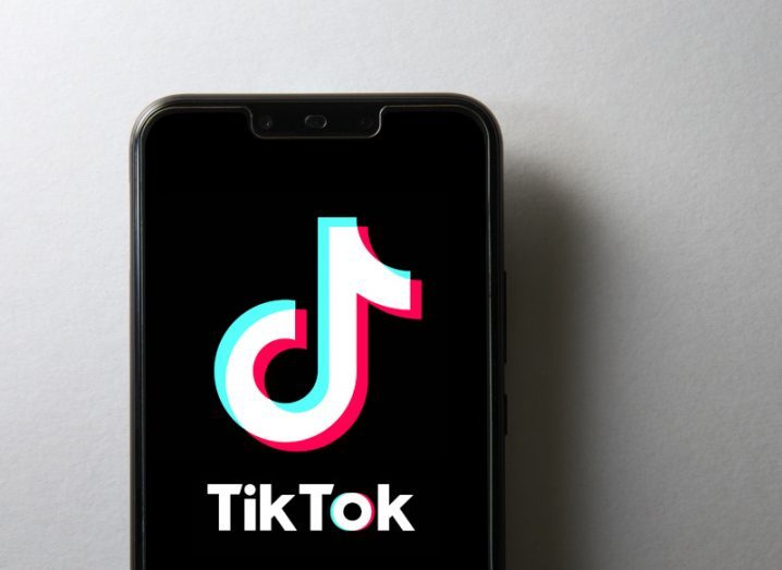 TikTok logo on a smartphone screen.