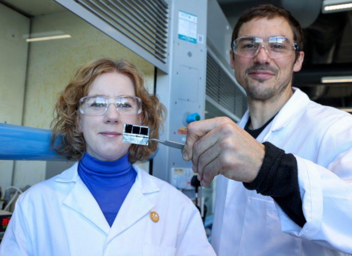 DCU researchers holding samples that will be sent to the moon.