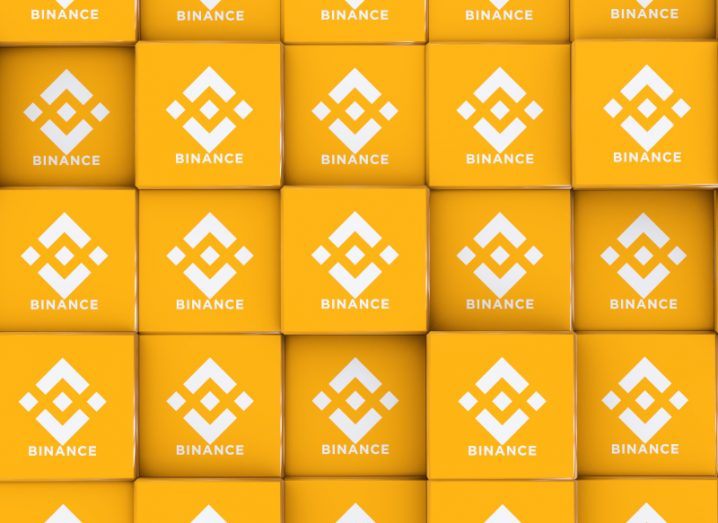 The Binance logo on multiple orange squares, which makes up the entire image.