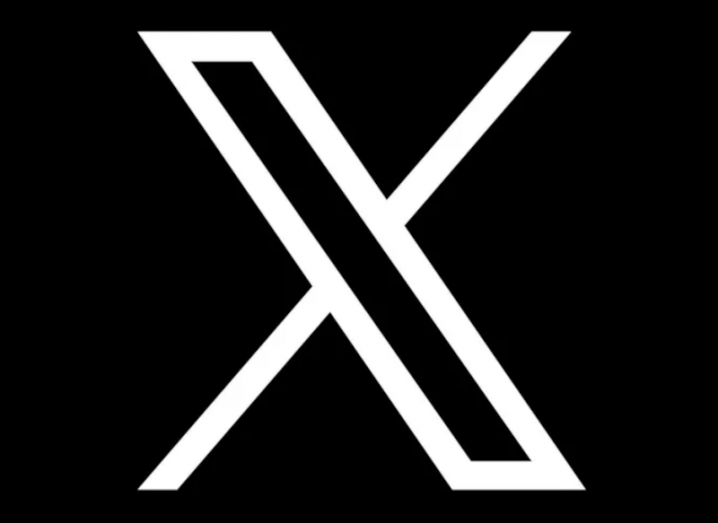 A white X logo in a black background.