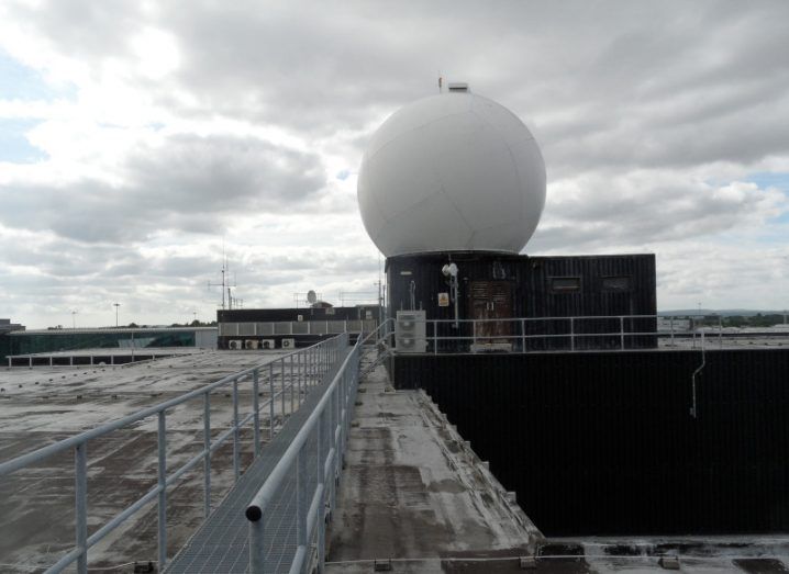 A rood with a white dome on the top. The dome is a Met Éireann weather radar.