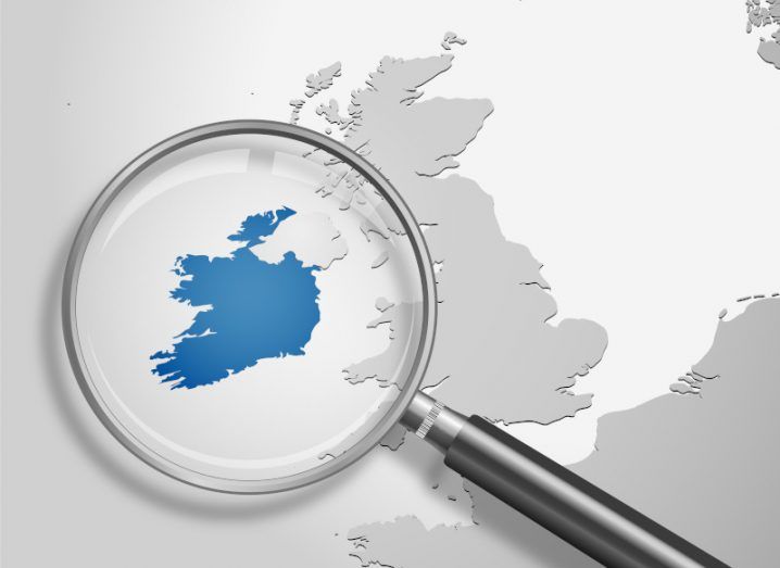 A map of the UK and Ireland with a magnifying glass over Ireland. The Republic of Ireland is coloured blue while the rest of the image is grey.