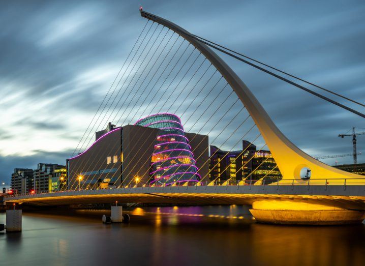 The Samuel Beckett Bridge in Dublin, Ireland during what appears to be dusk.