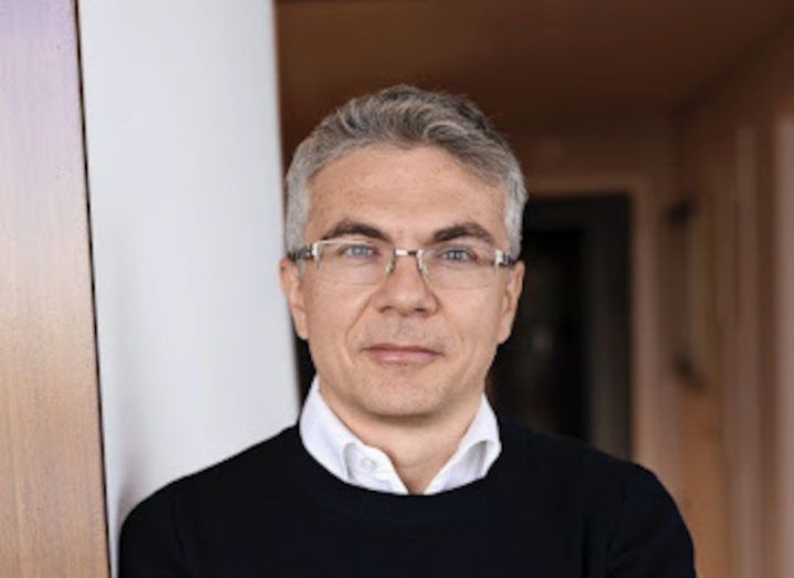 An image of Jerome Pesenti wearing a black jumper in a hallway.