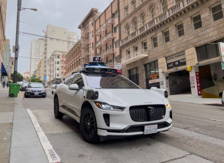A Waymo self-driving vehicle on a street.