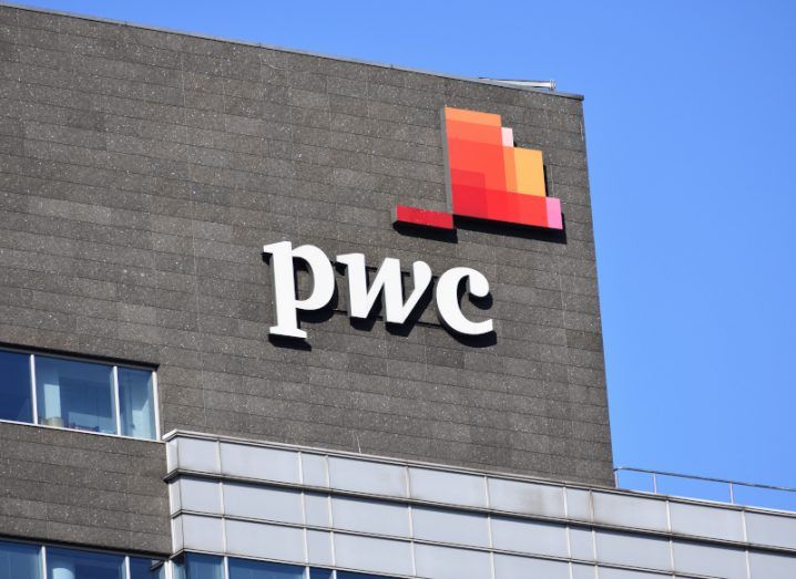 The PwC logo on the side of a building.