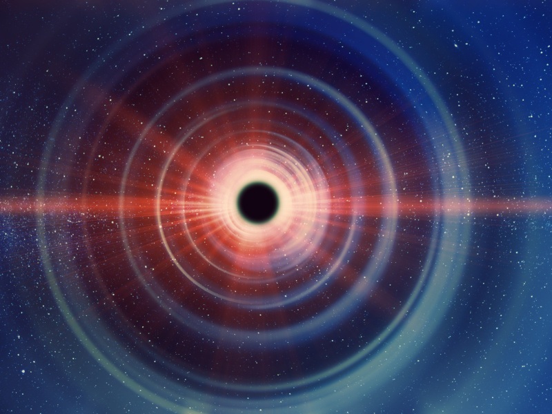 Illustration of a black hole with light stemming out from it.