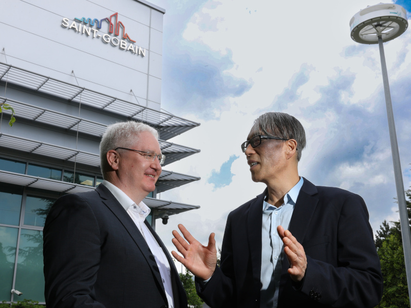 Saint-Gobain Life Sciences CEO Sung Yu talks to Daragh Monaghan at the office opening.