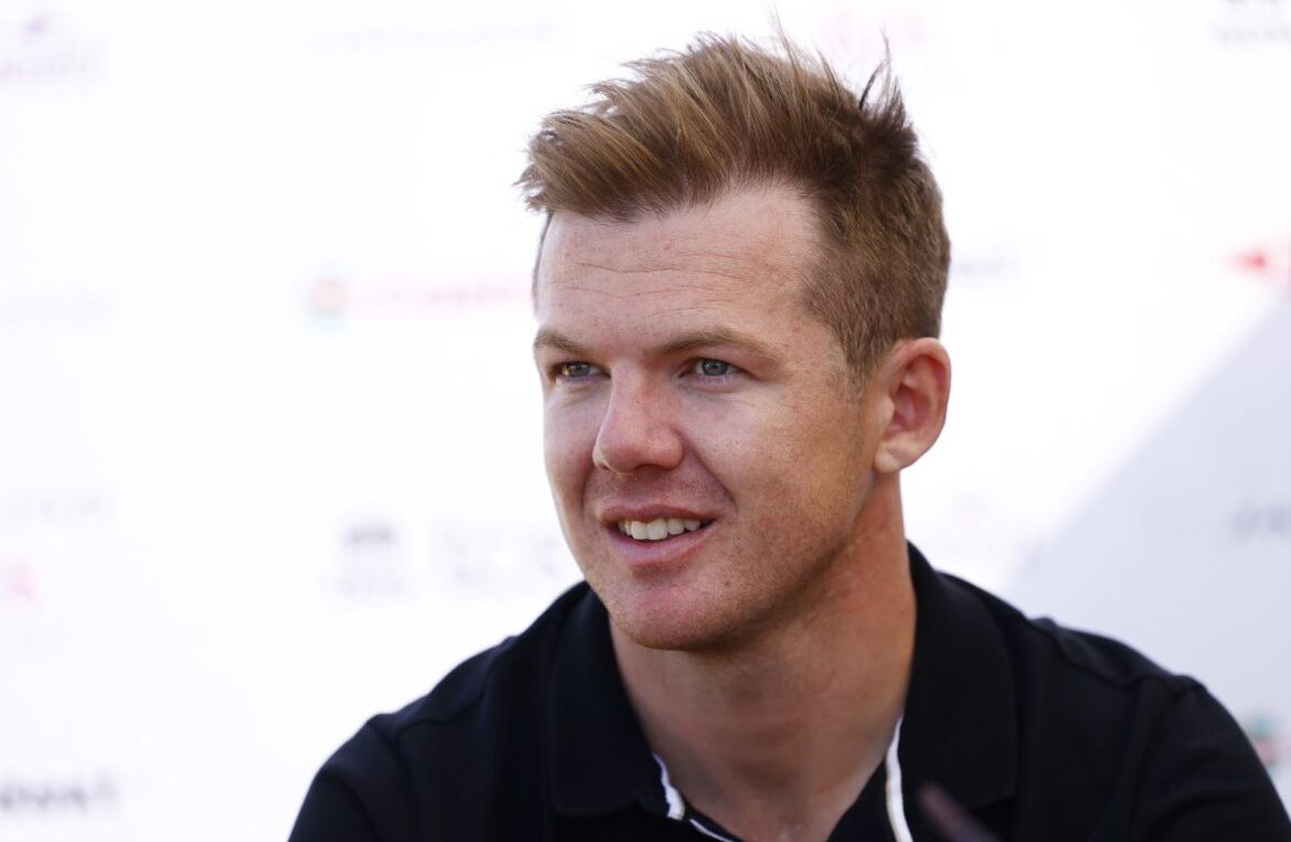 An image of Nick Cassidy in front of a white background.