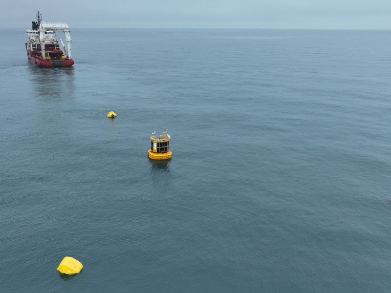 A Green Rebel LiDAR buoy in the ocean.