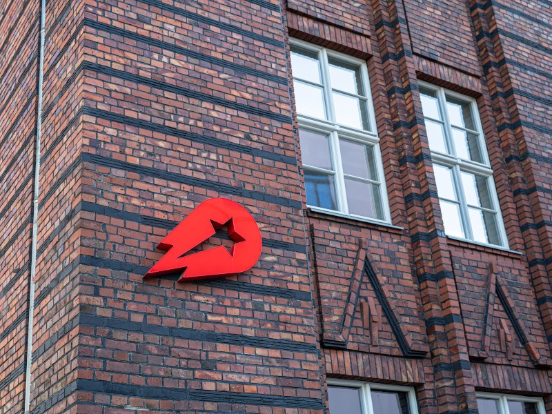 Delivery Hero logo on a building.