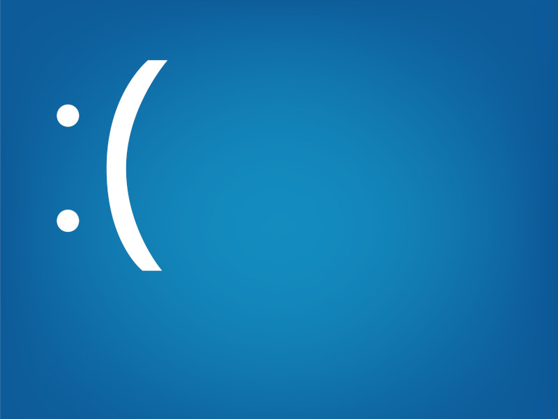 Illustration of the Blue Screen of Death caused by the Crowdstrike IT outage. It is a frowning emoji.