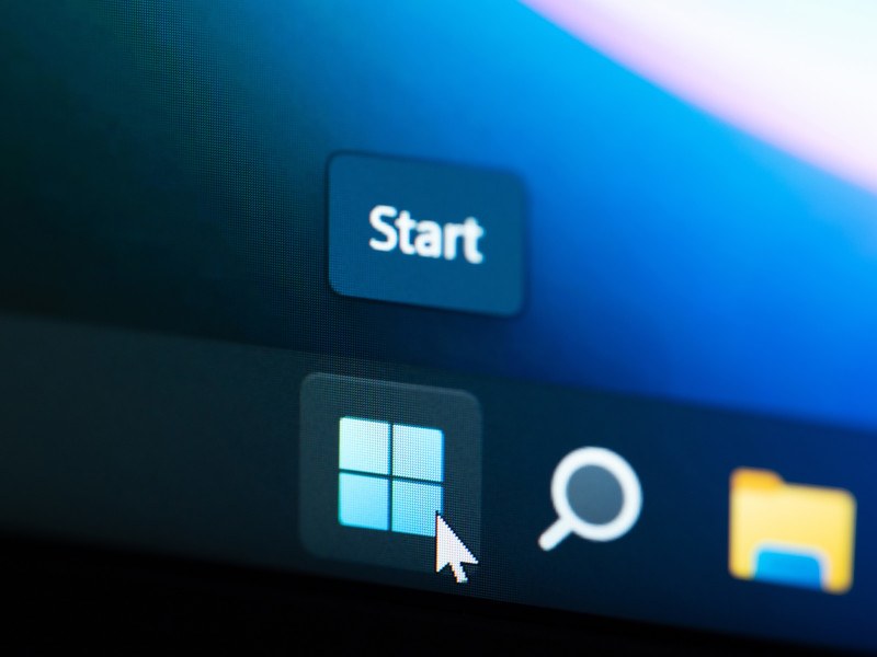 Cursor on a Windows icon with the word start written on top.