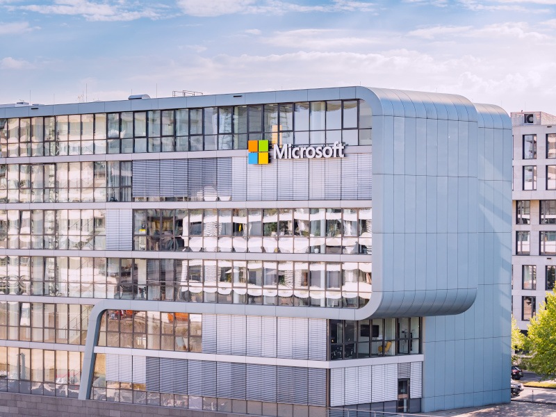 A large building with the Microsoft logo on the side of it.