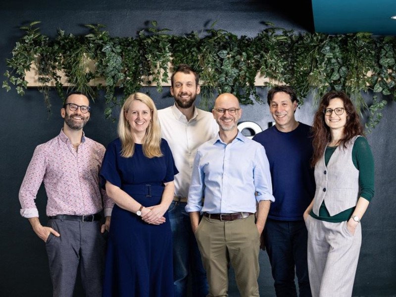 A group of men and women who are part of the Riverlane management.