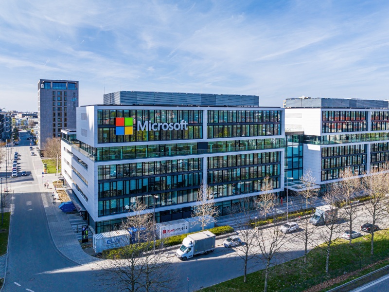 A large building with the Microsoft company logo on the side.