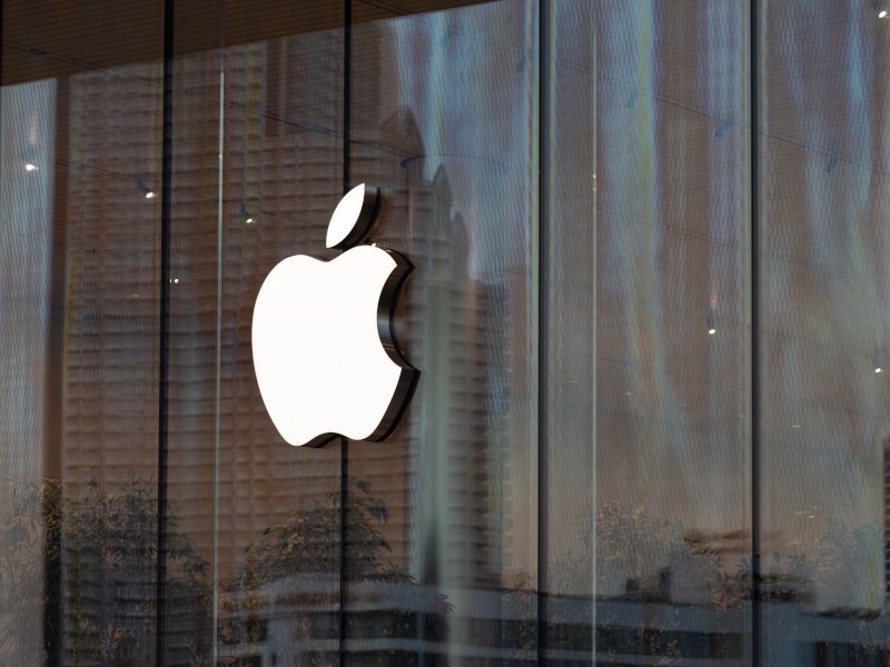 The Apple logo on the side of a building.