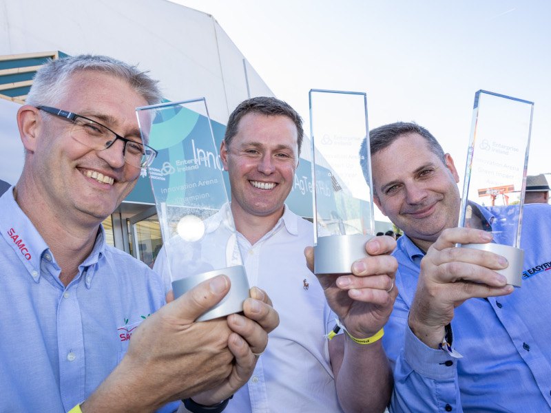 Three white men holding transparent glass awards. From left to right: Robert Shine, Samco, winner of the Innovation Arena Champion Award, Kieran Supple, Reap Interactive, winner of the Startup Innovator of the Year Award and Ronan Boyle, EASYFIX winner of the Green Impact Award.