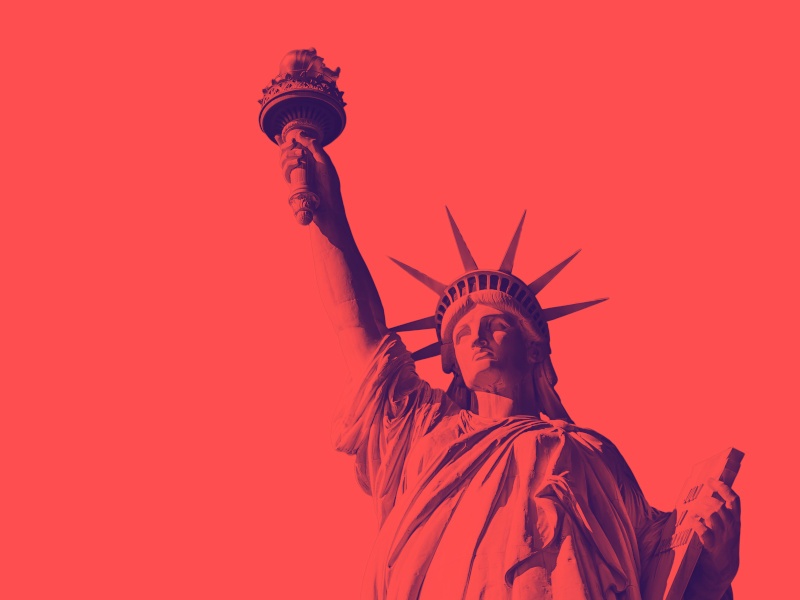 A pinkish-red picture with the Statue of Liberty at the centre.