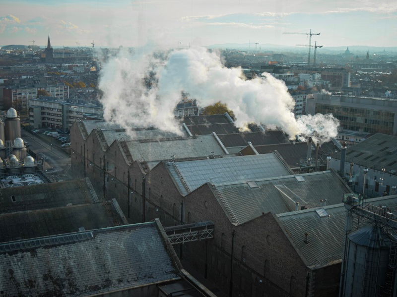 Aerial view of Dublin city’s industrial part with fog and smoke.